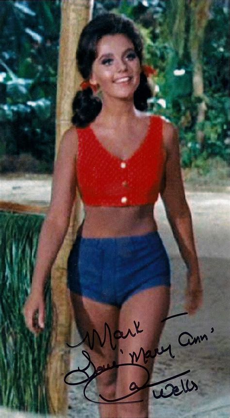 American actress Dawn Wells, in character as Mary Ann, wears a bikini ...